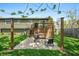 Backyard patio perfect for entertaining, features a grill and a dining set up for outdoor dining at 3615 Dawnwood Dr, Indianapolis, IN 46227