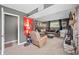 Relaxing basement with a cozy sectional, recliner, and a faux brick fireplace at 3615 Dawnwood Dr, Indianapolis, IN 46227