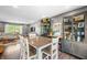 Bright dining area featuring modern furnishings and decor with ample natural light and stylish built-in cabinets at 3615 Dawnwood Dr, Indianapolis, IN 46227