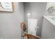 Bright entryway with coat hooks, pendant lighting, and view of the living area from the stairs at 3615 Dawnwood Dr, Indianapolis, IN 46227