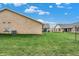 Spacious backyard with lush green grass, perfect for outdoor activities and relaxation at 400 E Charter Dr, Muncie, IN 47303