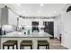 Modern kitchen featuring granite countertops, white cabinets, and stainless steel appliances at 400 E Charter Dr, Muncie, IN 47303