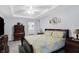 Bright main bedroom features a large bed, side tables, and neutral decor at 400 E Charter Dr, Muncie, IN 47303