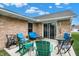 Outdoor patio offers seating with comfortable chairs and backyard views at 400 E Charter Dr, Muncie, IN 47303