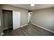 A cozy bedroom features a closet with sliding doors and modern wood-look flooring at 4120 Breton St, Indianapolis, IN 46222