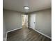 Comfortable bedroom with neutral walls, modern flooring, and easy access to the bathroom at 4120 Breton St, Indianapolis, IN 46222