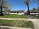 Cozy home with well-maintained lawn and driveway with a detached garage and mature trees in the yard at 4120 Breton St, Indianapolis, IN 46222