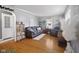 Cozy living room with hardwood floors, comfortable seating, and lots of natural light at 413 Vasbinder Dr, Anderson, IN 46017