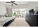 Spacious bedroom with carpet, natural light, and a seating area in front of large windows at 4707 Branch View Way, Indianapolis, IN 46234