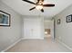 Bright bedroom features a ceiling fan, neutral walls and plush carpeting at 4707 Branch View Way, Indianapolis, IN 46234