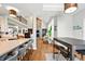 Spacious kitchen with a center island, bar seating, and open views into the living space at 4707 Branch View Way, Indianapolis, IN 46234