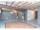 Spacious unfinished basement featuring painted walls and ceiling, and a hot water heater at 4814 Southeastern Ave, Indianapolis, IN 46203