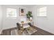 Bright office space with a modern desk, natural light, and wood floors at 4814 Southeastern Ave, Indianapolis, IN 46203