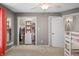 Bedroom featuring neutral walls, carpeted floor, bunk beds, and closet with storage at 4955 N 500 W, Columbus, IN 47201