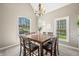 Inviting dining room featuring a wood table, natural light, and neutral color palette at 4955 N 500 W, Columbus, IN 47201