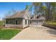 Beautiful two-story home featuring a large driveway, a two car garage and a manicured front yard at 4955 N 500 W, Columbus, IN 47201