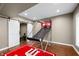 Game room with hardwood flooring and a basketball game at 4955 N 500 W, Columbus, IN 47201