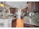 Spacious kitchen featuring granite countertops, stainless steel appliances, and an open floor plan at 4955 N 500 W, Columbus, IN 47201