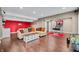 Spacious basement living room with hardwood floors, a bar area, and cozy seating at 4955 N 500 W, Columbus, IN 47201