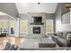 Comfortable living room with stone fireplace and hardwood floors at 4955 N 500 W, Columbus, IN 47201