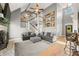 Bright living room with comfortable seating, high ceilings, and staircase to the upper level at 4955 N 500 W, Columbus, IN 47201