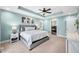 Relaxing main bedroom with a tray ceiling and an en-suite bathroom at 4955 N 500 W, Columbus, IN 47201