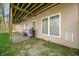 View of covered patio with outdoor seating and grill, perfect for entertaining at 4955 N 500 W, Columbus, IN 47201