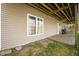 A well-lit, covered patio featuring outdoor seating, ideal for relaxing and entertaining at 4955 N 500 W, Columbus, IN 47201
