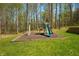 Backyard featuring a playground with a slide and swing set at 4955 N 500 W, Columbus, IN 47201