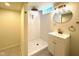 Newly renovated bathroom featuring a white shower and modern vanity at 5135 N Kenwood Ave, Indianapolis, IN 46208