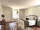 Tastefully decorated bedroom with a comfortable bed, stylish accents, and ample closet space at 5135 N Kenwood Ave, Indianapolis, IN 46208