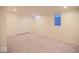 Spacious carpeted bedroom featuring a window, closet and neutral paint at 5135 N Kenwood Ave, Indianapolis, IN 46208