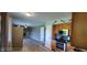 Open-concept space with a kitchen view and living area with a stone fireplace at 5444 S Holiday Dr, Columbus, IN 47203
