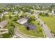 Aerial view of a community pool with a basketball court, a gazebo, and picturesque landscaping at 5698 Kenderly Ct, Carmel, IN 46033