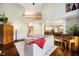 Open living area with hardwood floors, plenty of natural light, and open to kitchen at 5698 Kenderly Ct, Carmel, IN 46033