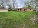 Expansive backyard with well-maintained lawn and storage shed at 5774 N Ewing St, Indianapolis, IN 46220