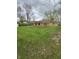 Expansive backyard with well-maintained lawn and brick exterior at 5774 N Ewing St, Indianapolis, IN 46220