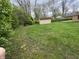 Large backyard featuring green lawn and shed at 5774 N Ewing St, Indianapolis, IN 46220