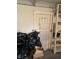 Unfinished basement with white brick walls, and a storage system at 5774 N Ewing St, Indianapolis, IN 46220