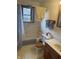Functional bathroom with walk in shower and tiled walls at 5774 N Ewing St, Indianapolis, IN 46220