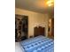 Comfortable bedroom featuring an open closet and a wooden dresser at 5774 N Ewing St, Indianapolis, IN 46220