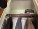 A closet shelf featuring games like Monopoly and Clue at 5774 N Ewing St, Indianapolis, IN 46220