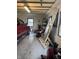 View of a garage featuring a window and miscellaneous storage at 5774 N Ewing St, Indianapolis, IN 46220