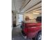 Attached garage with white walls and open doorway leading to the main house at 5774 N Ewing St, Indianapolis, IN 46220