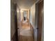 Hallway with wood trim and wallpapered walls at 5774 N Ewing St, Indianapolis, IN 46220