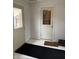 Mud room features a welcoming mat and door leading to the laundry room with machines visible at 5774 N Ewing St, Indianapolis, IN 46220