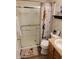 Cozy bathroom featuring a glass shower, sunflower decor, and a charming 'Sunshine' bathmat at 5912 Accent Dr, Indianapolis, IN 46221