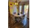 Cozy dining nook with a round table and chairs, perfect for casual meals with backyard views at 5912 Accent Dr, Indianapolis, IN 46221