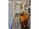 Hallway with a wooden bench and decor adding character and functionality to the home's entrance at 5912 Accent Dr, Indianapolis, IN 46221