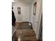 Inviting entryway with wood-look flooring and multiple doors offering convenient access at 5912 Accent Dr, Indianapolis, IN 46221